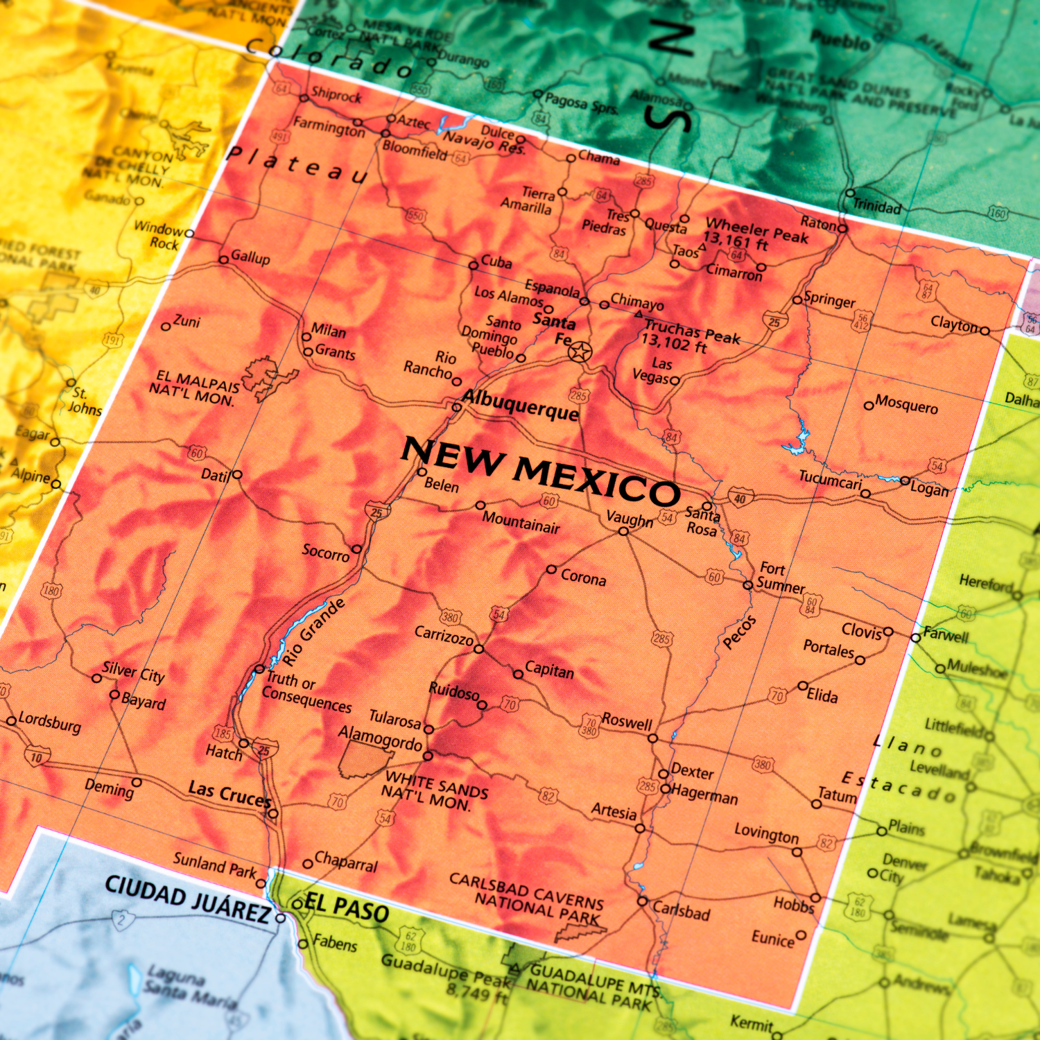 Map of New Mexico highlighting Albuquerque, Las Cruces, Rio Rancho, Santa Fe, and Roswell — featured on the New Mexico Party Store page by Party By Imagination.