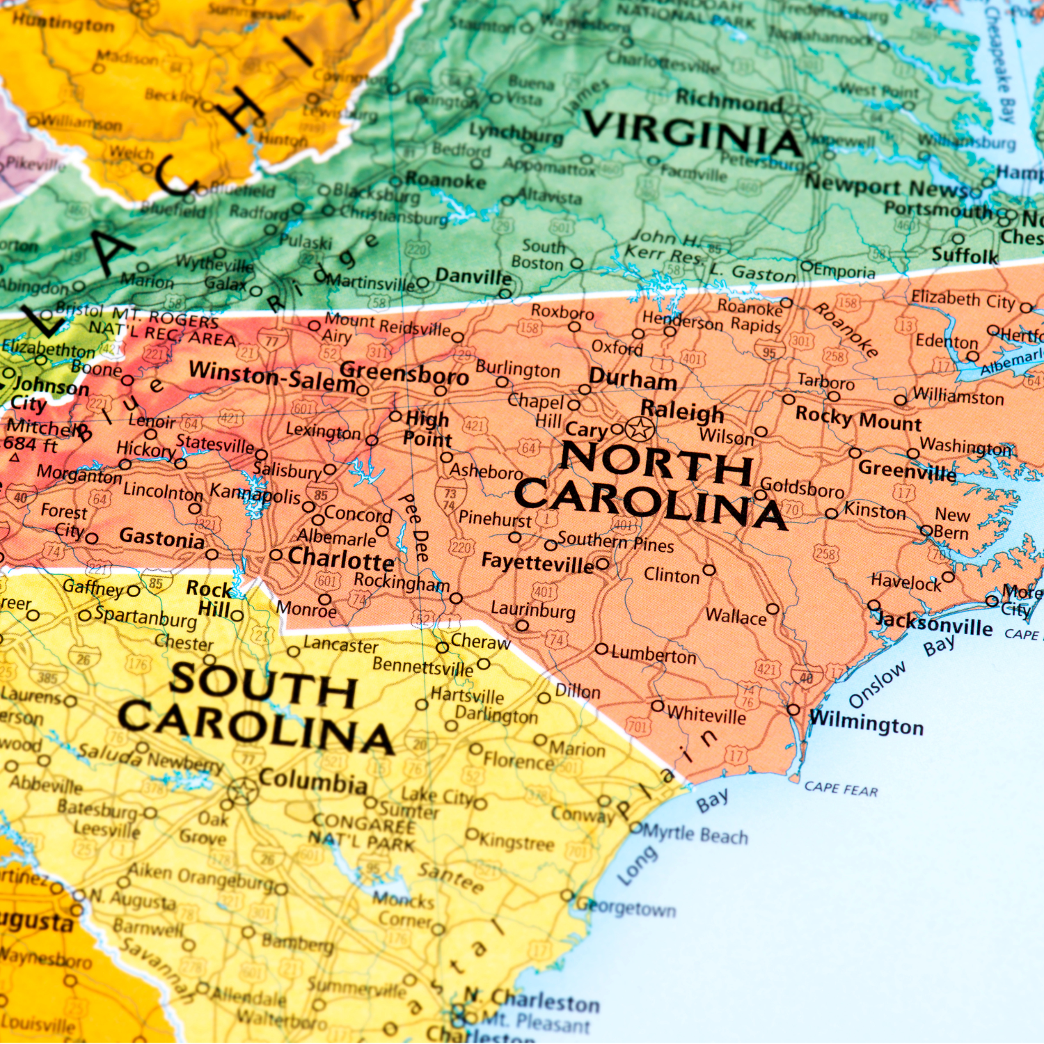 Map of North Carolina highlighting Charlotte, Raleigh, Greensboro, Durham, and Winston-Salem — featured on the North Carolina Party Store page by Party By Imagination.