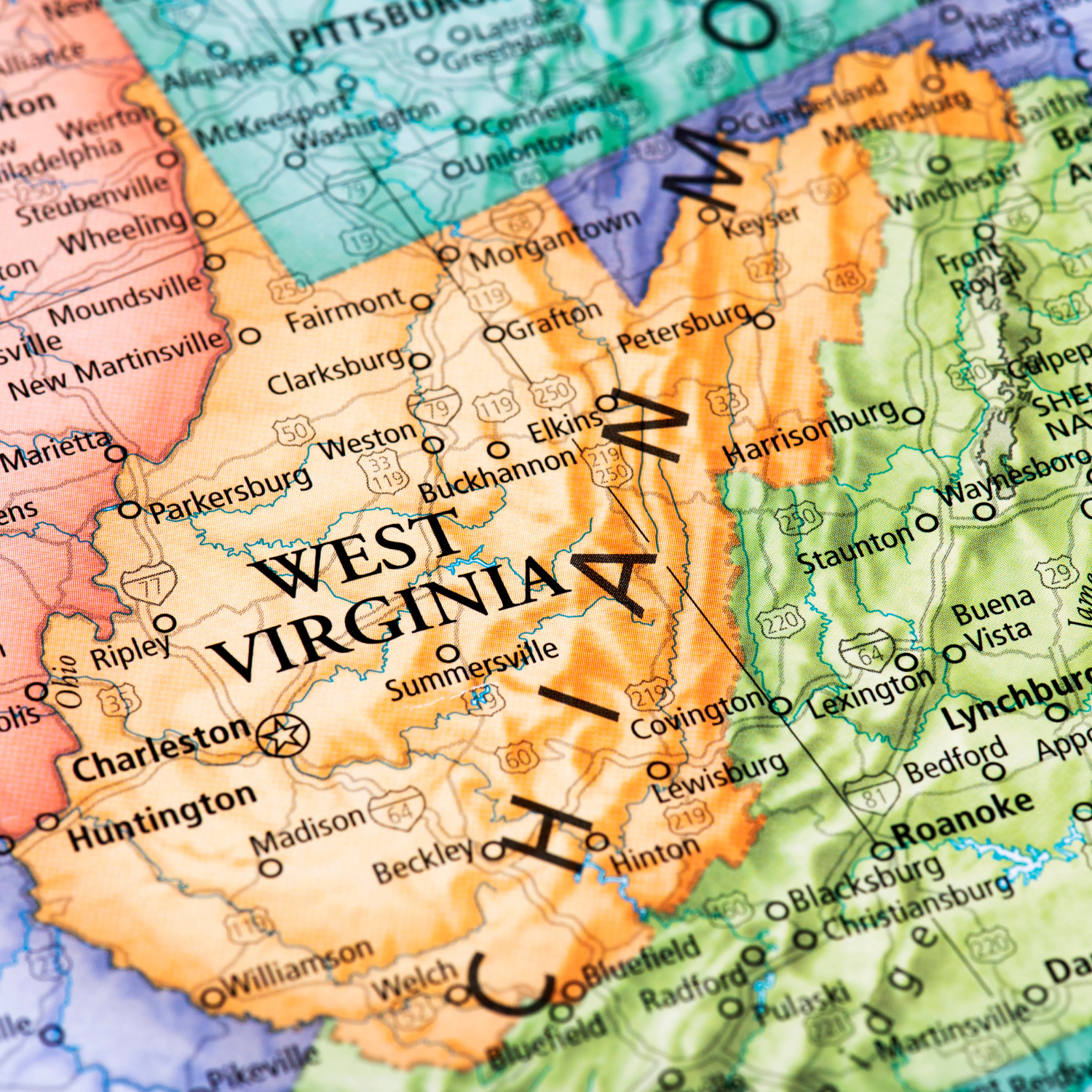 Map of West Virginia highlighting Charleston, Huntington, Morgantown, Parkersburg, Wheeling, and Martinsburg — visual guide for the West Virginia Party Store by Party By Imagination.